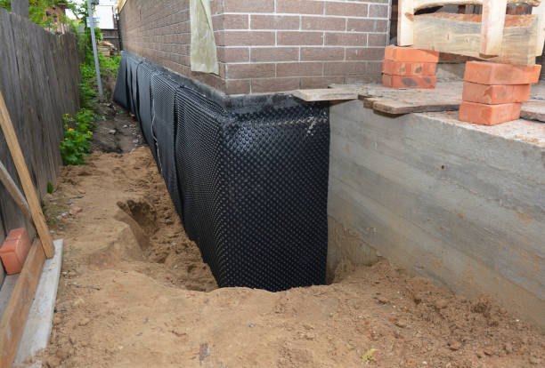 SJ Waterproofing Pros technician performing targeted Waterproofing assessment in Woodbury, NJ